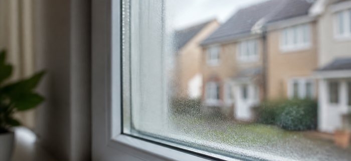 Misted double glazing with condensation trapped between the panes
